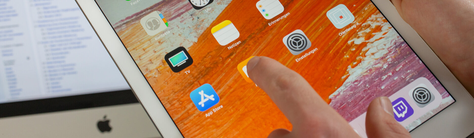 Ein Icon auf dem iPad wird angeklickt.